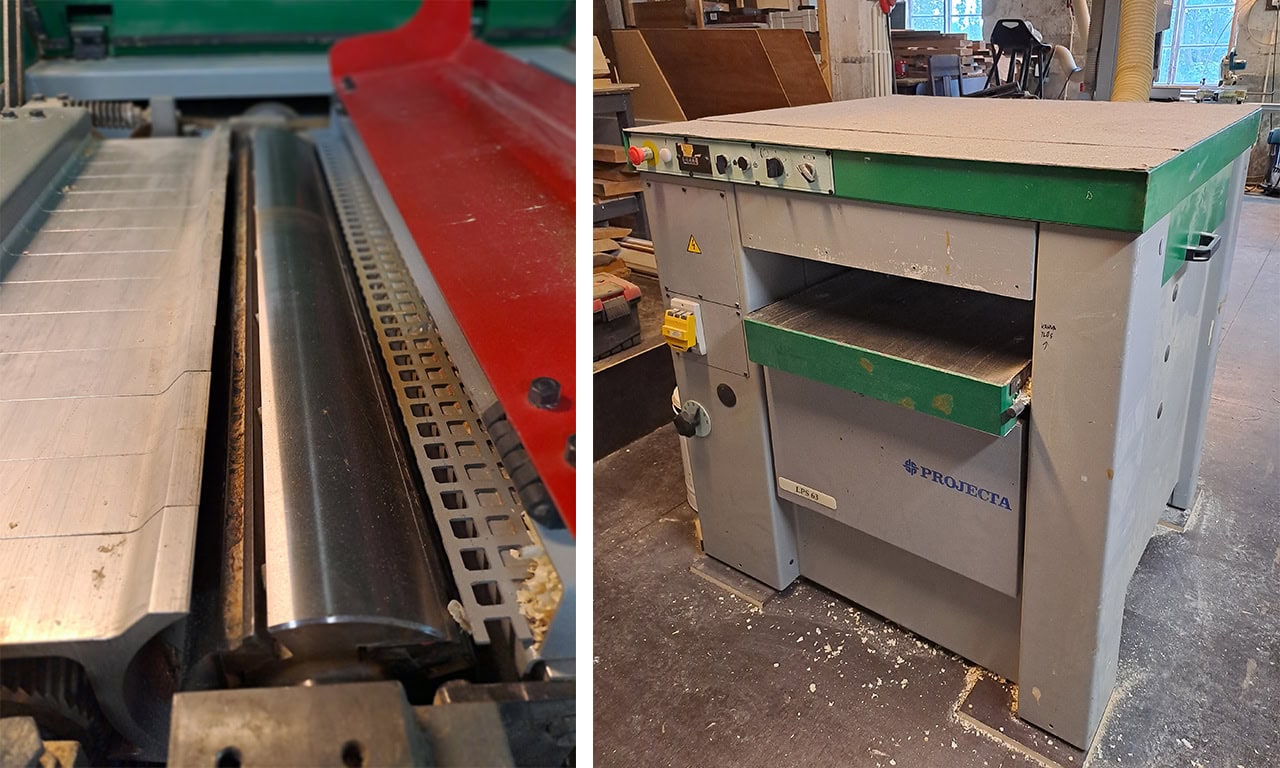 SAC LPS63 tasohöylä 1280x768 | Projecta Close up of a metal roller and feed area on a woodworking machine with a red guard nearby in a workshop