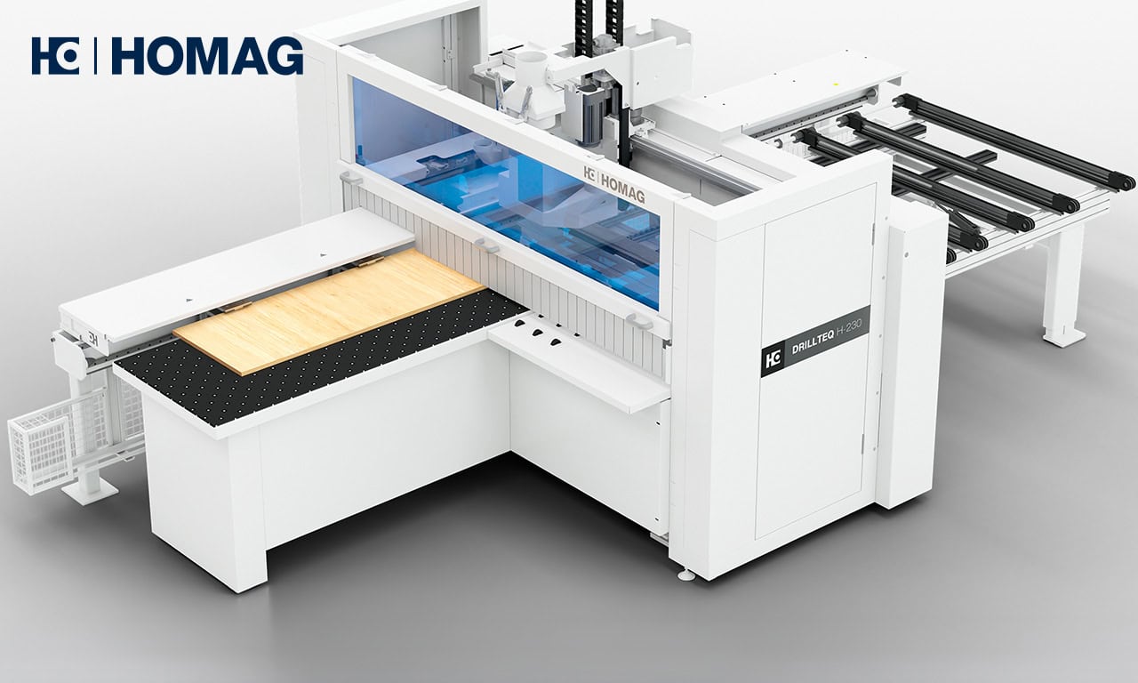 HOMAG panel processing machine in white with a wood board on the feed conveyor and a blue tinted safety windowed chamber